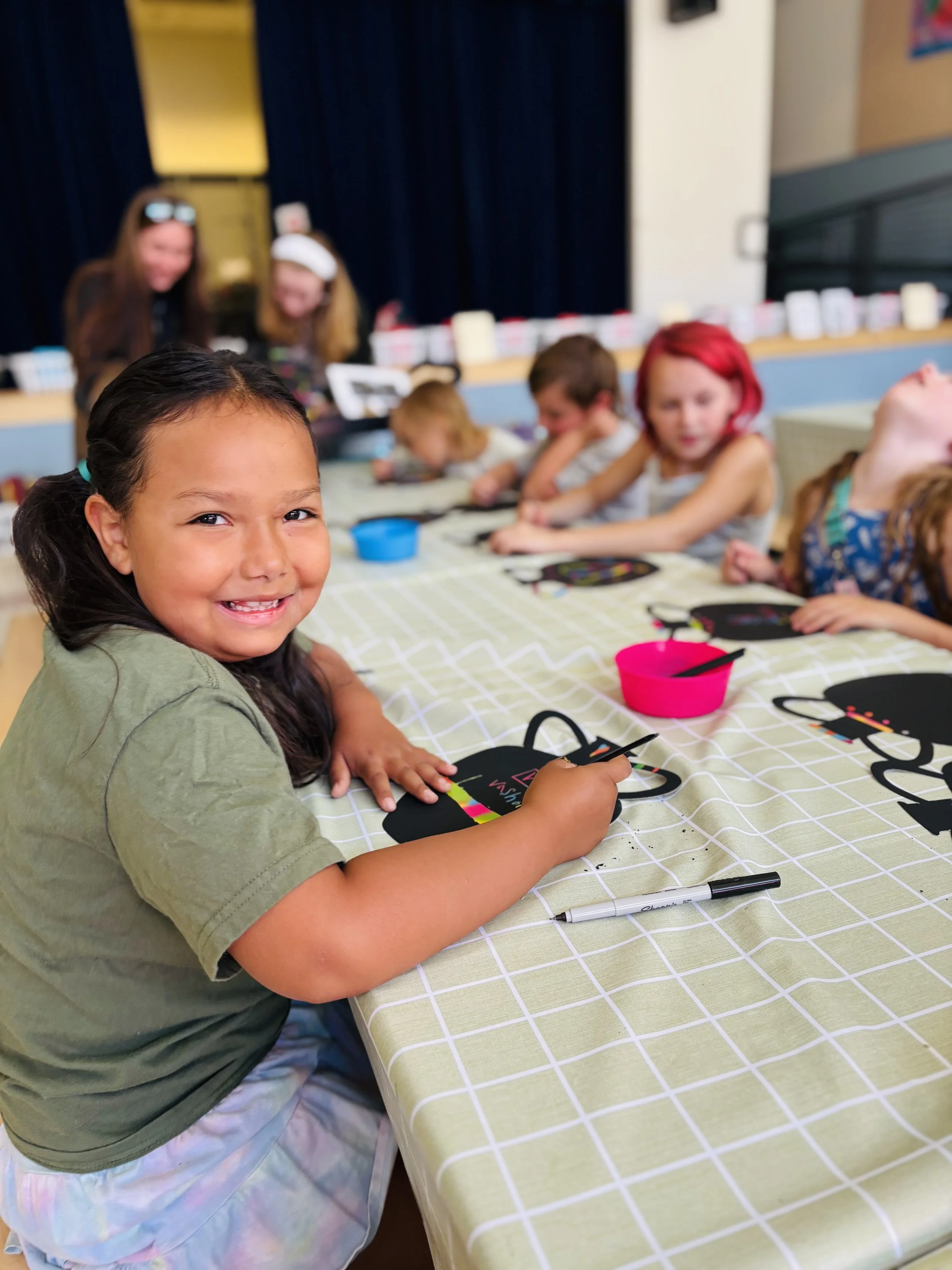 replace Zeleigh holding rainbow.jpg