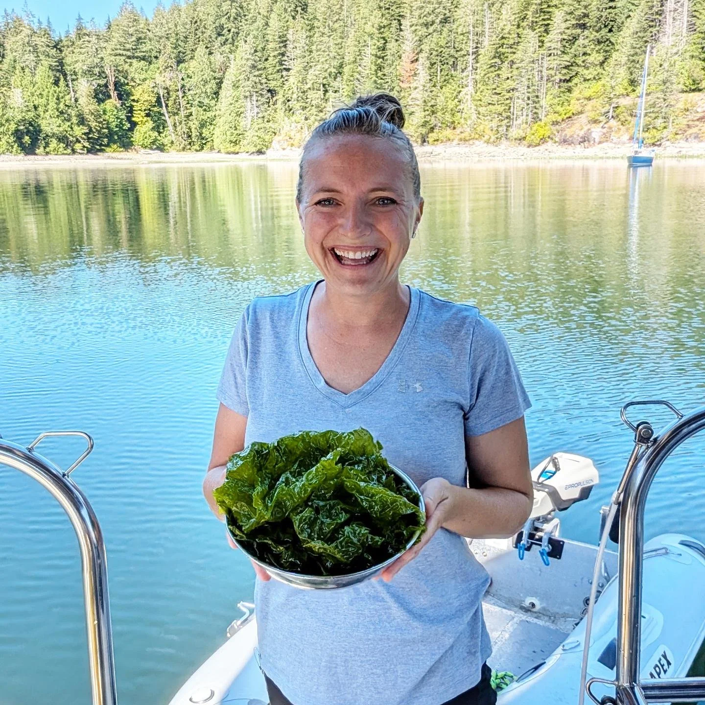 π₯ My heart is so happy!  One of my goals this summer was to harvest some seaweed. 
So at low tide this morning, I went out and got my first batch of sea lettuce. 
I'm going to try making a raw seaweed salad with it for lunch, and dry some to make