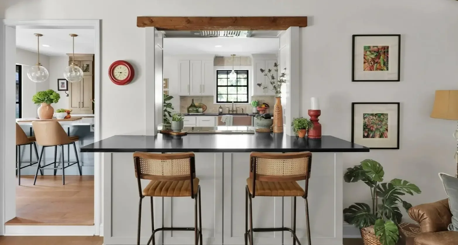 Leather sofa in a psychology-informed vacation rental living room design.