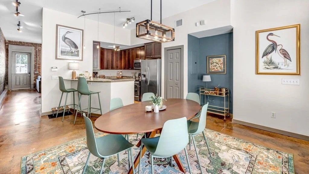 Dining space designed with balanced proportions, circular seating, and warm lighting to encourage connection, comfort, and relaxed conversation.