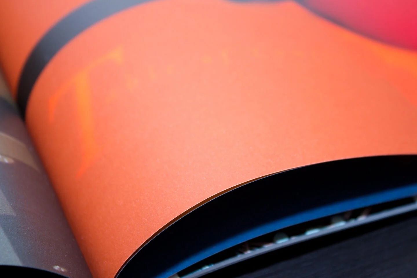 Museum Launch Celebration Book — Creative paper overlays emulate the translucency of glass.