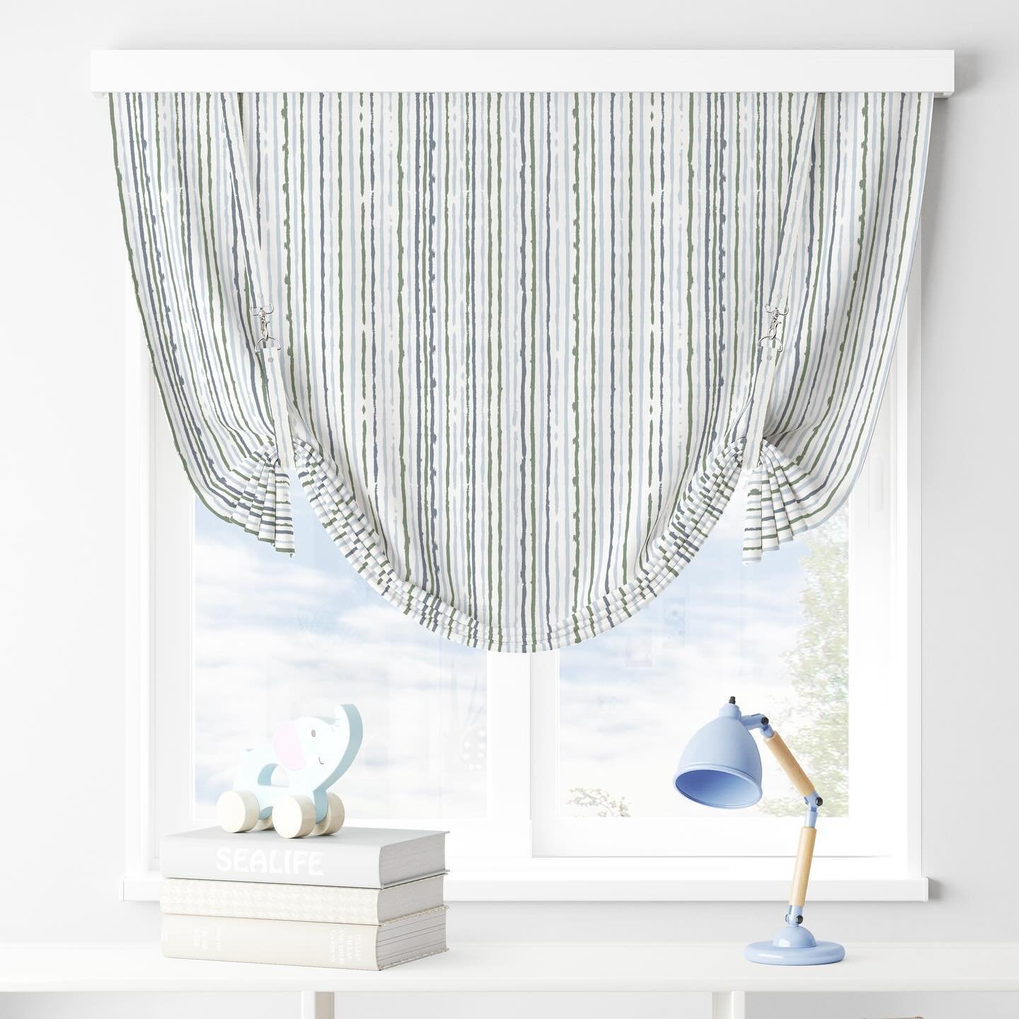 We love a good stripe for window treatments! Our Culver stripe adds a playful pop of pattern to this custom Roman shade. Shown in sky/multi colorway. 
.
.
.
.

#fabricdesign #linentextiles #interiorstyling #moderntextiles
#textiledesign #fabric #inte