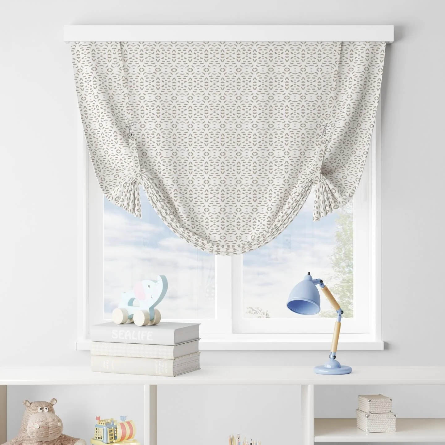 Our Ventana print brings soft movement and quiet charm to this sweet kids&rsquo; room, styled here as a roman shade. With its small-scale motif and artful texture, it adds a subtle yet thoughtful layer to any space.

Available in customizable colorwa