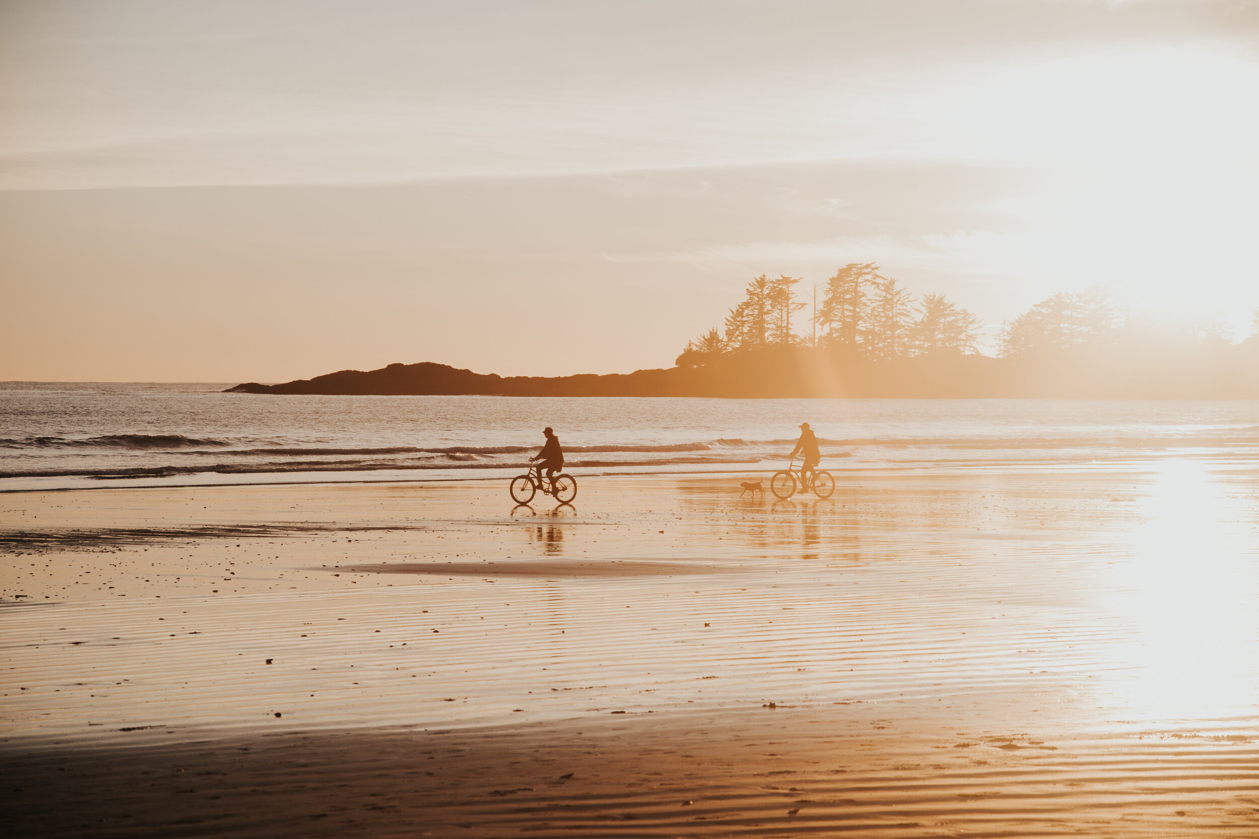 Bike riding on the beach in Tofino