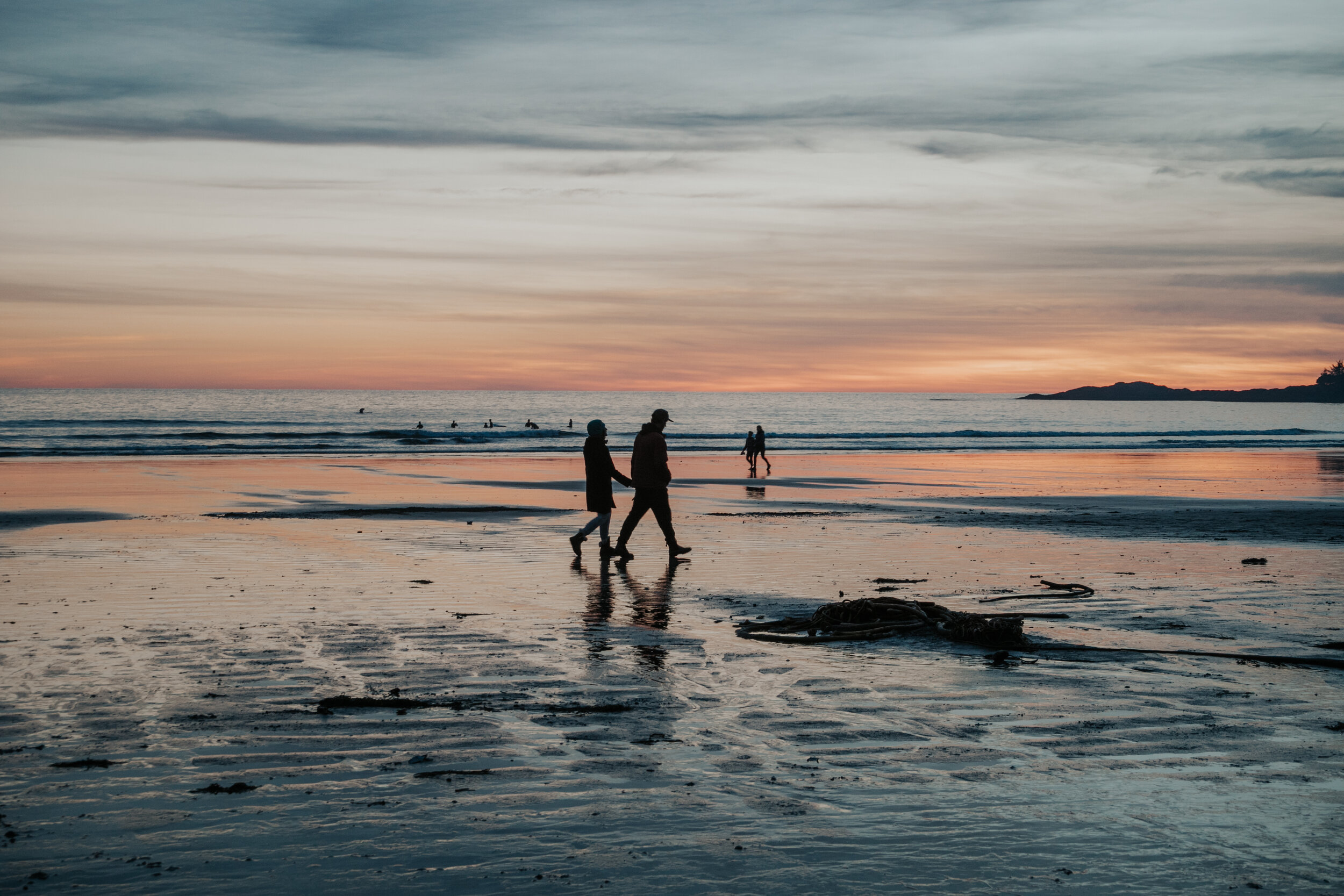 Silhouette of a couple walking on Chesterman Beach