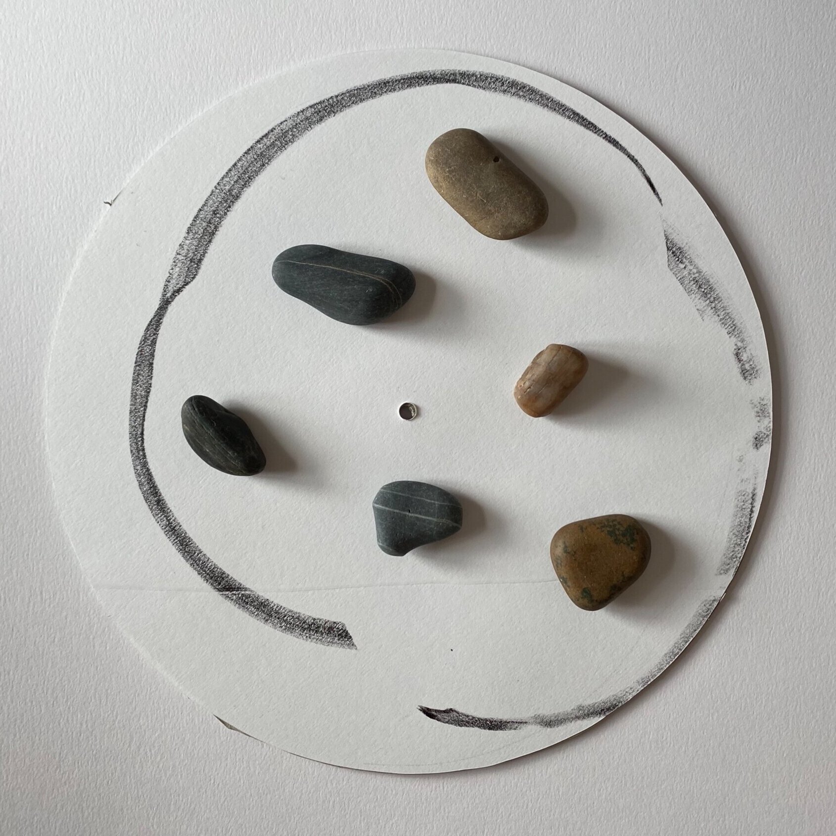 Installation View, Turntable Drawing: Untitled #5, Ink and pebbles on paper, 31cm x 31cm