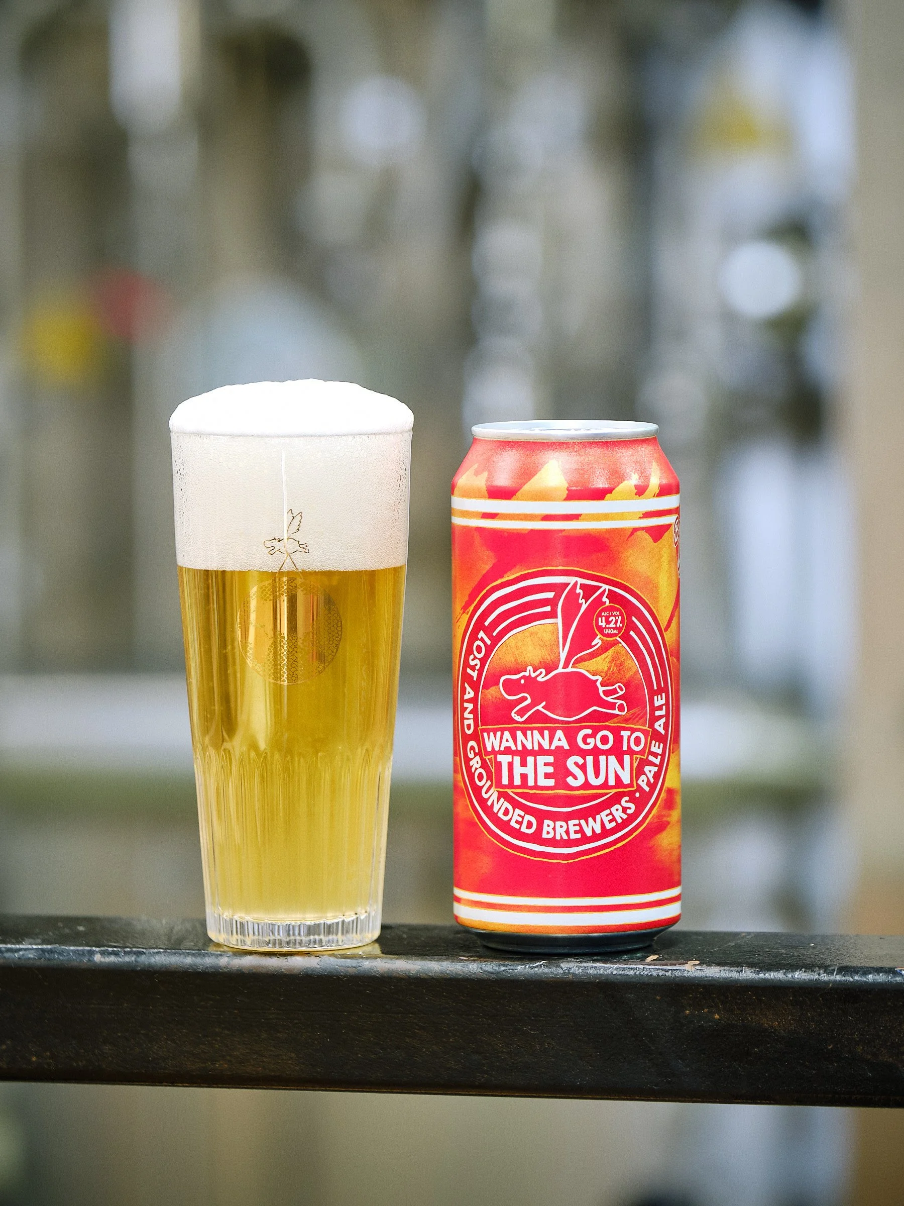 A can of Lost and Grounded Wanna Go to The Sun (Pale Ale 4.2%), next to a filled glass.