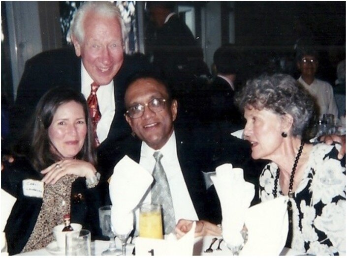  Ambassador Bill Lane greeting Lakshman, who is seated at dinner with Mrs. Jean Lane and Miss Lane.   Photo courtesy: Lakshman Ratnapala  