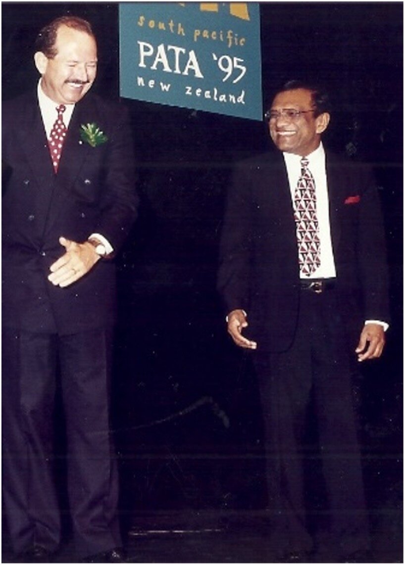  Mr. Michael Paulin, who was called to substitute for PATA Chairman at short notice, steps out on stage at the Annual Conference in New Zealand 1995, cheered on by PATA President Lakshman Ratnapala.   Photo courtesy: Lakshman Ratnapala  