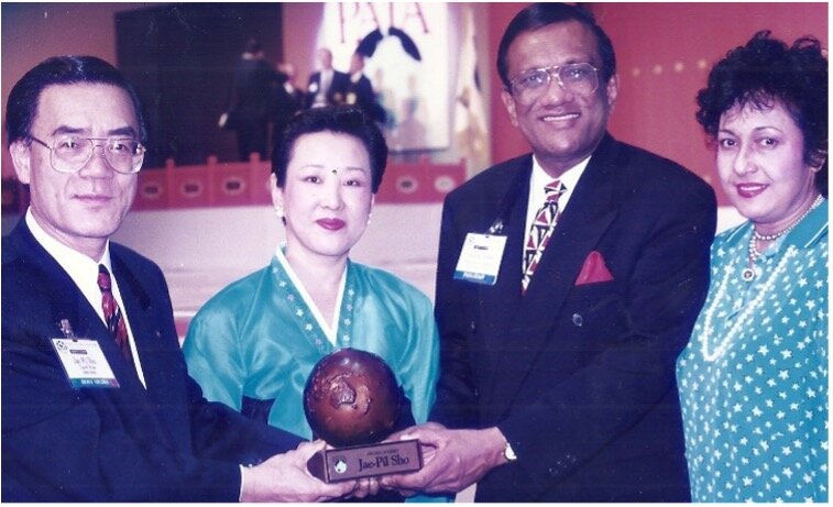  Jae-Pil Sho (Life Member 2009), Chairman &amp; Publisher of Travel Press, Korea (ROK), seen accepting the PATA Life Membership along with his wife Moonja from PATA President Lakshman Ratnapala and his wife Barbara.   Photo courtesy: Lakshman Ratnapa