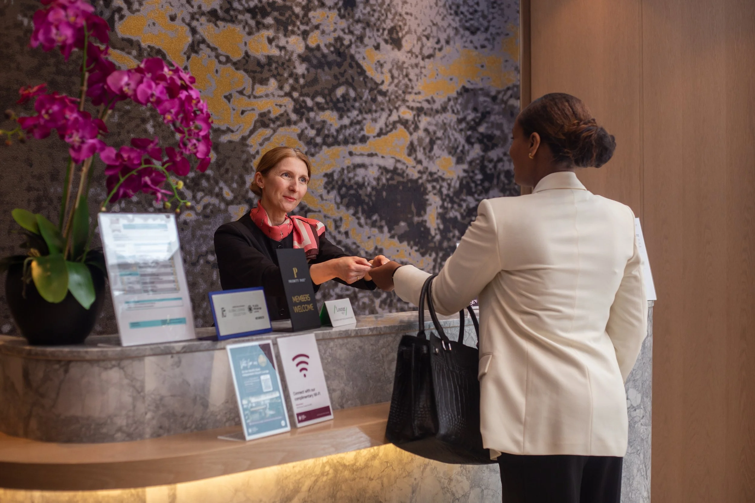 Aurora – Guest checking-in at reception.jpg