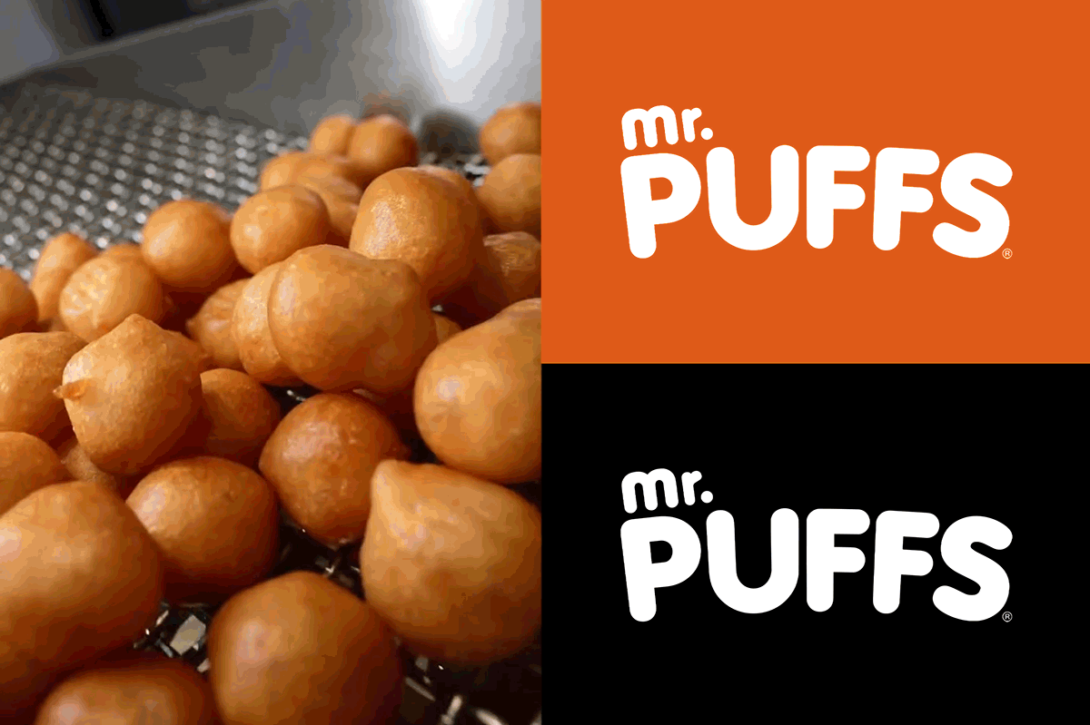 lose-up of freshly fried Mr. Puffs showing golden texture