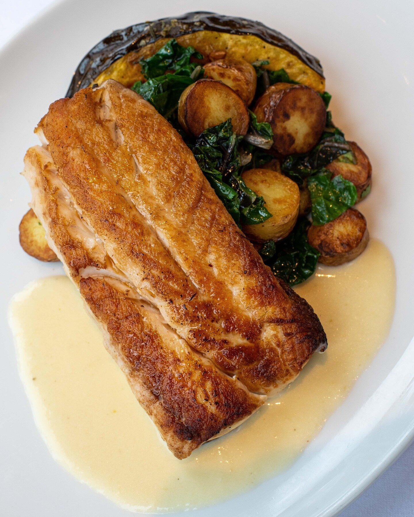 Featured Fish every week during Lent! 🐟⁠
⁠
This week:⁠
⁠
Striped Sea Bass from Virginia with roasted fingerling potatoes, Swiss chard, acorn squash, and Vidalia soubise.⁠
⁠
#special #fishspecial #featuredfish #fishfriday #fishfry #lentspecials #lent