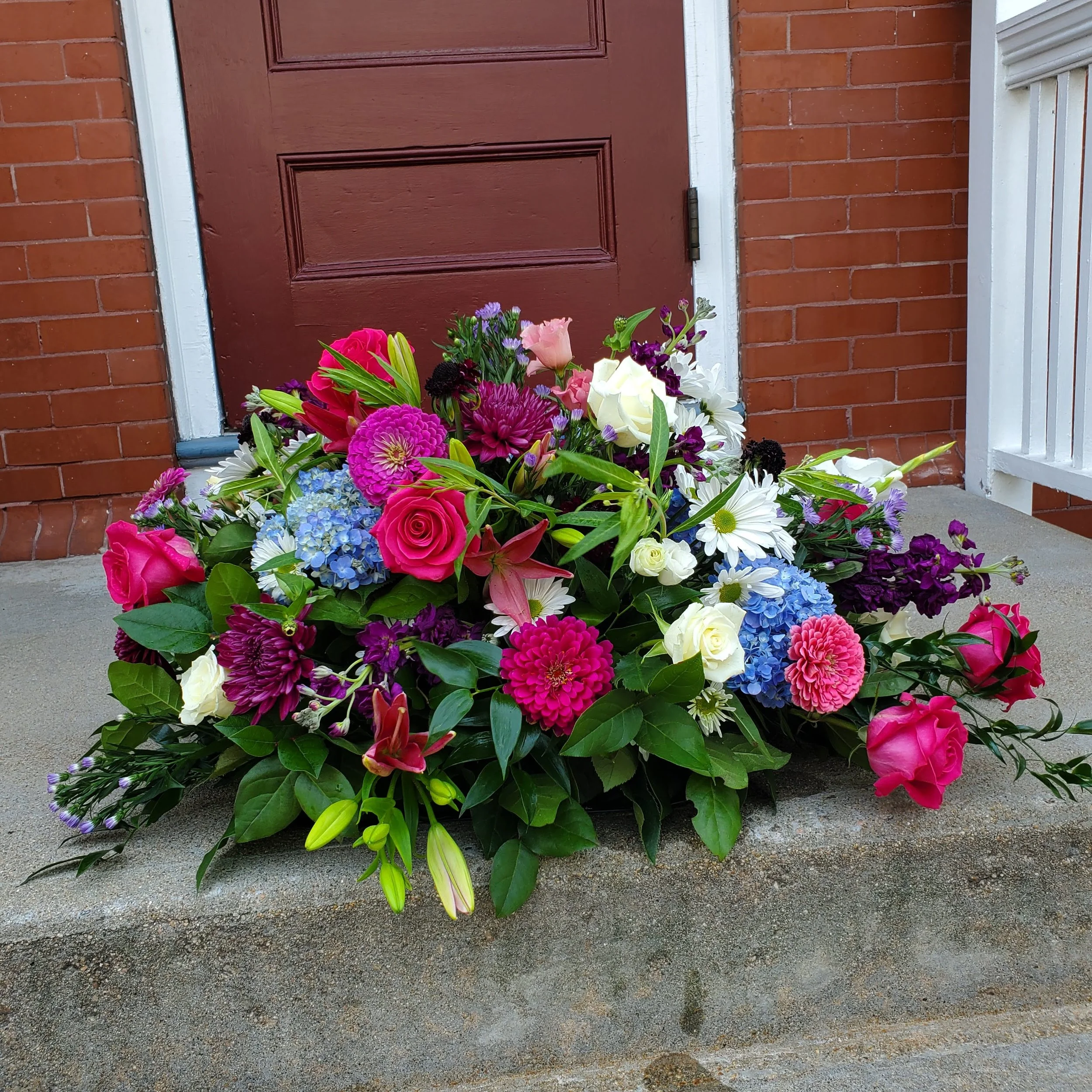 Chic and Classy Dahlia Casket Half Spray - $300. The Final Celebration of Life Should be Nothing Less than Beautiful.