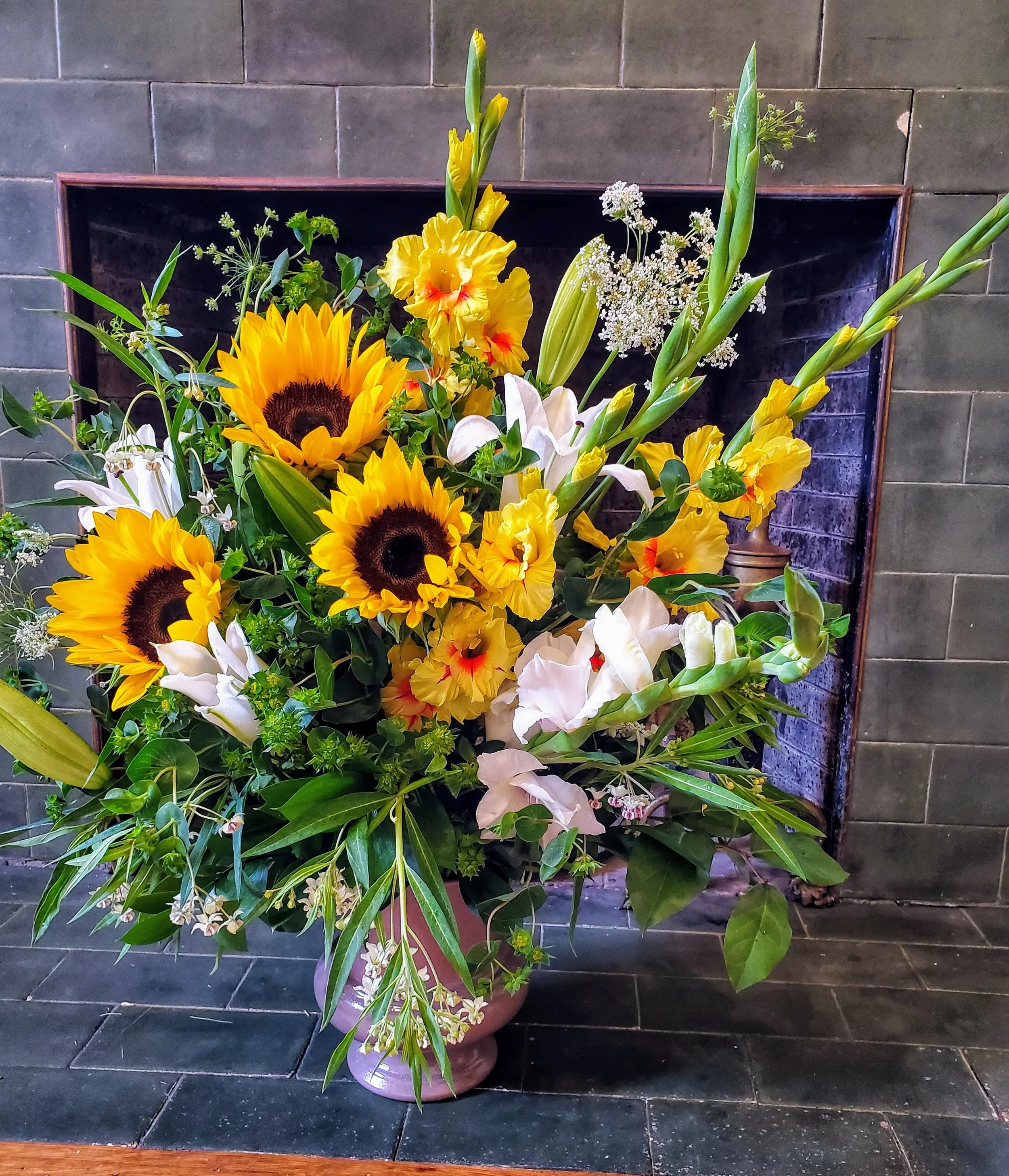 Captivating Sunflower and Gladiolas Funeral Arrangement - $175 to $300