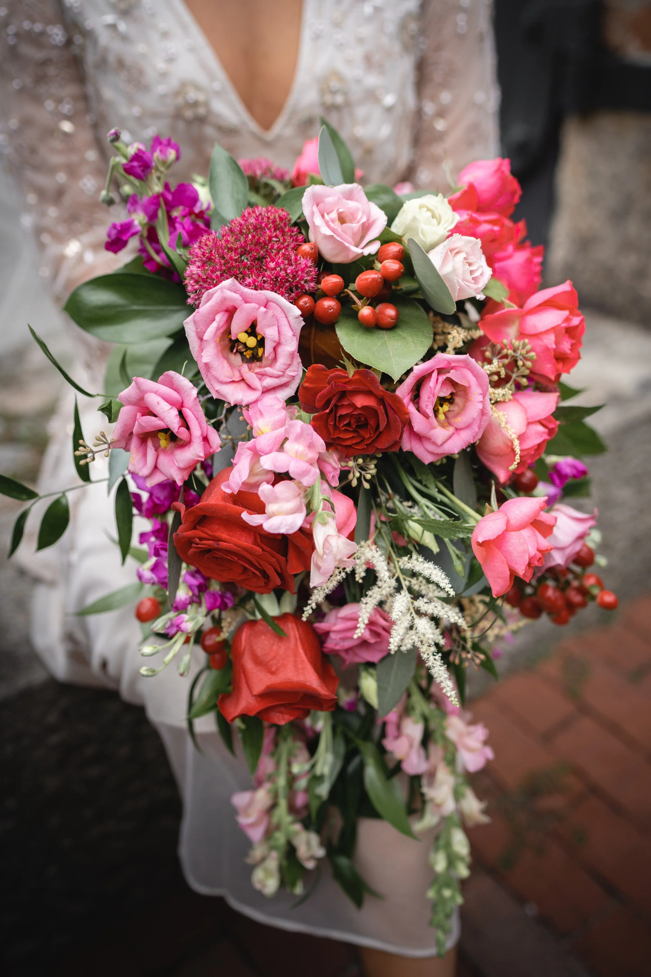 draping bridal bouquet with astilbe, dust miller, italian ruscus