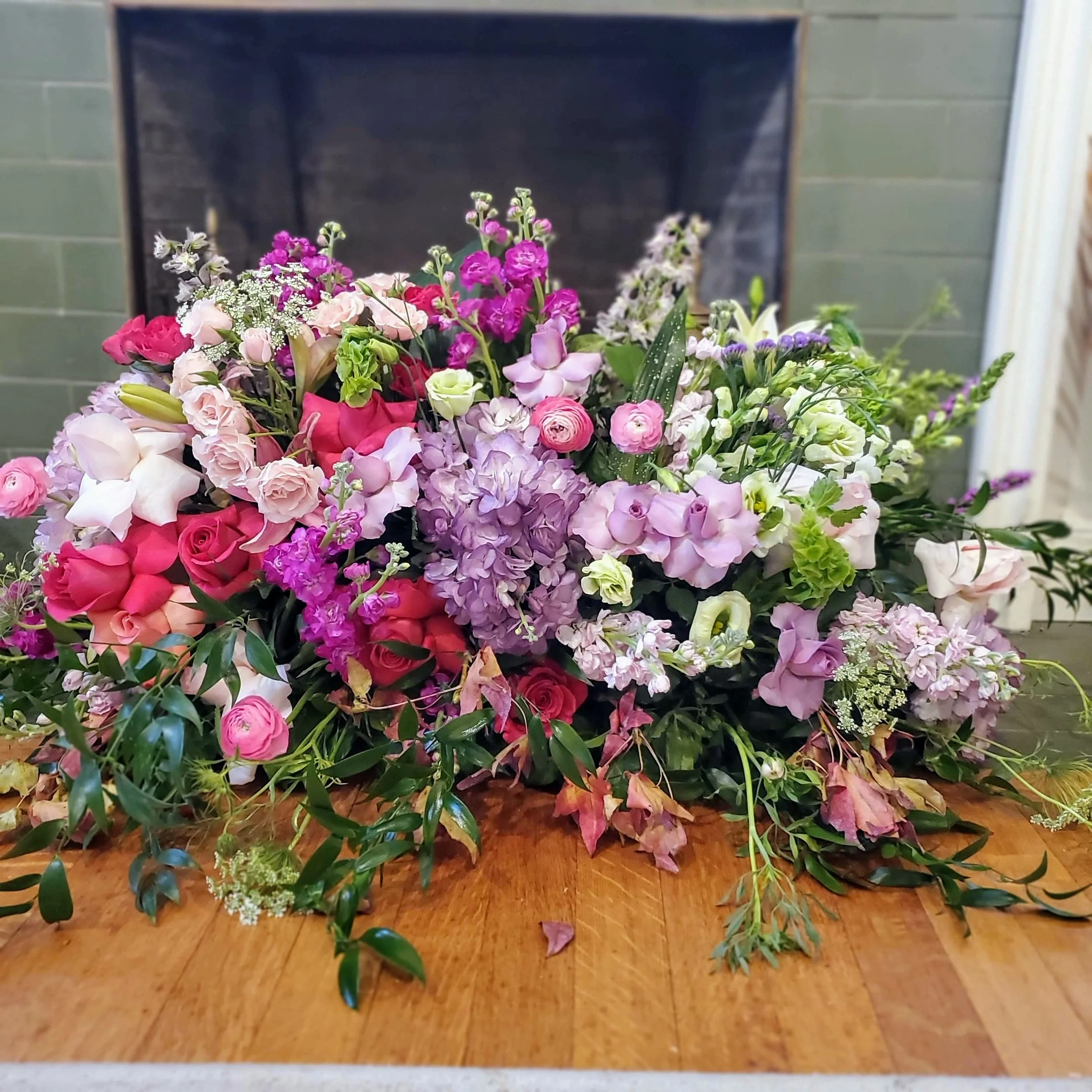 Luxurious casket spray embracing the beauty of your beloved. - $375 to $600