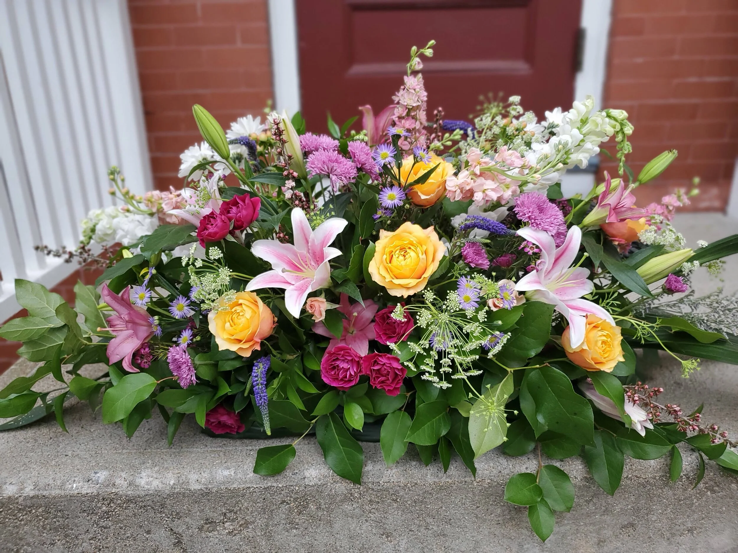 Soft and Feminine Funeral Casket Spray - $300 to $575 - Half sprays start at $200