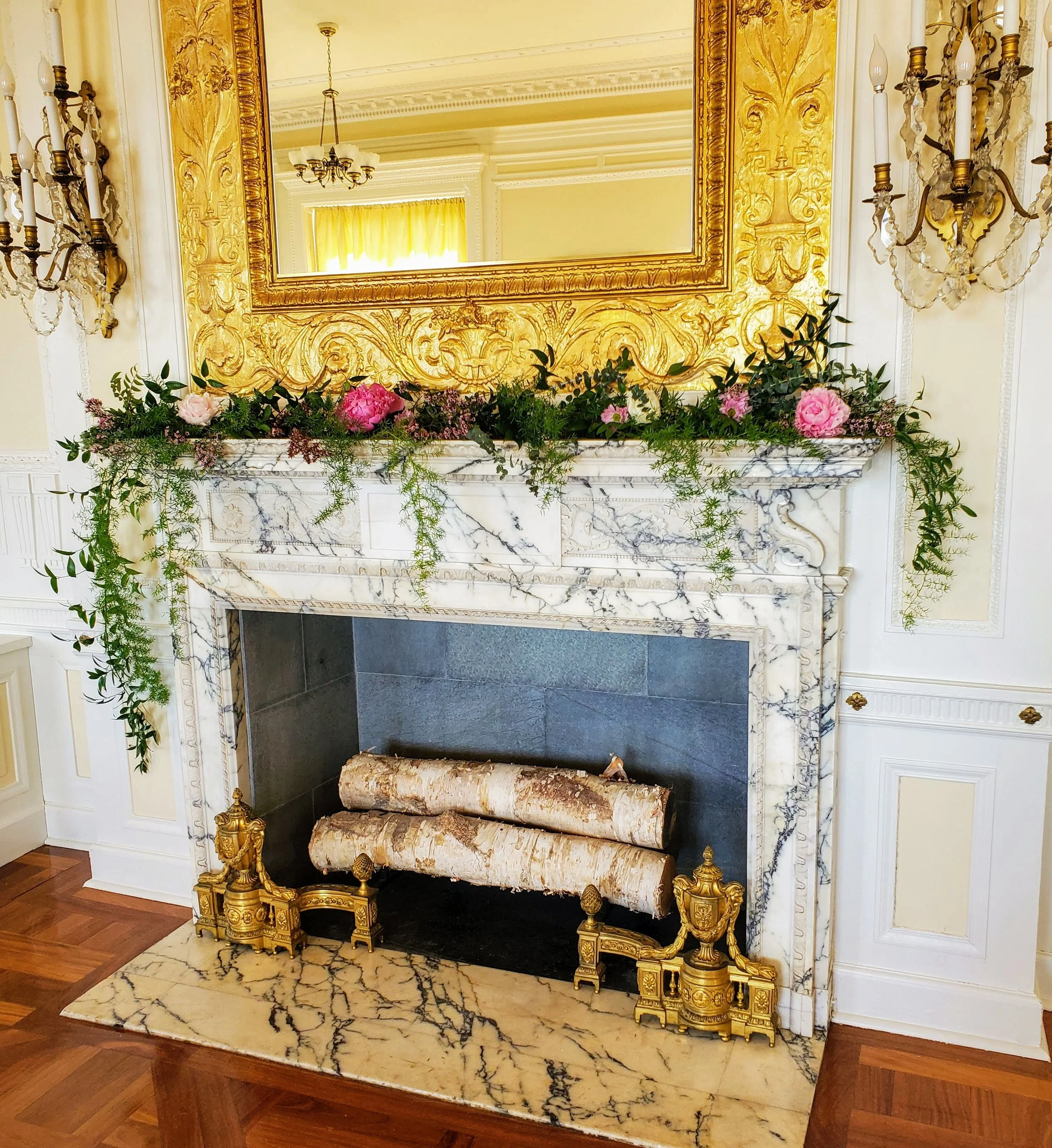 Mantle flowers with a pop of pink and white