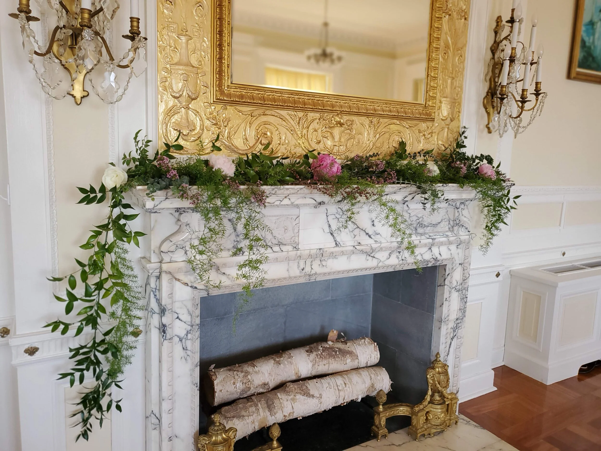 Mantle flowers with a pop of pink and white