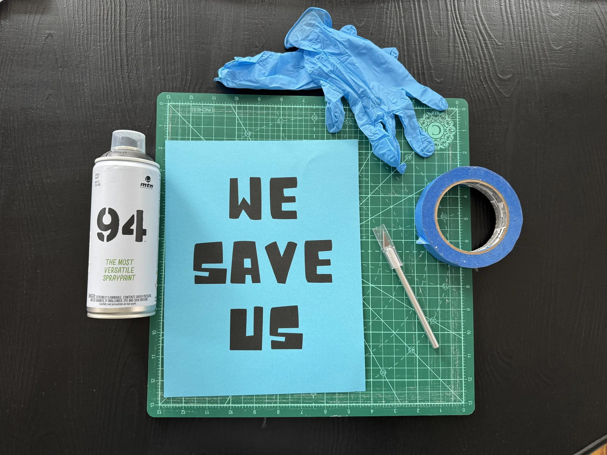 Materials: Cutting board, x-acto knife, tape, rubber gloves, spray paint.
NOTE: spray paint cannot be sold in Chicago proper, you have to head to the suburbs to purchase.