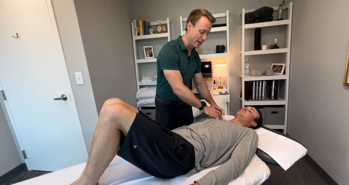 Travis Gerrald demonstrating manual therapy techniques to improve mobility for golfers.