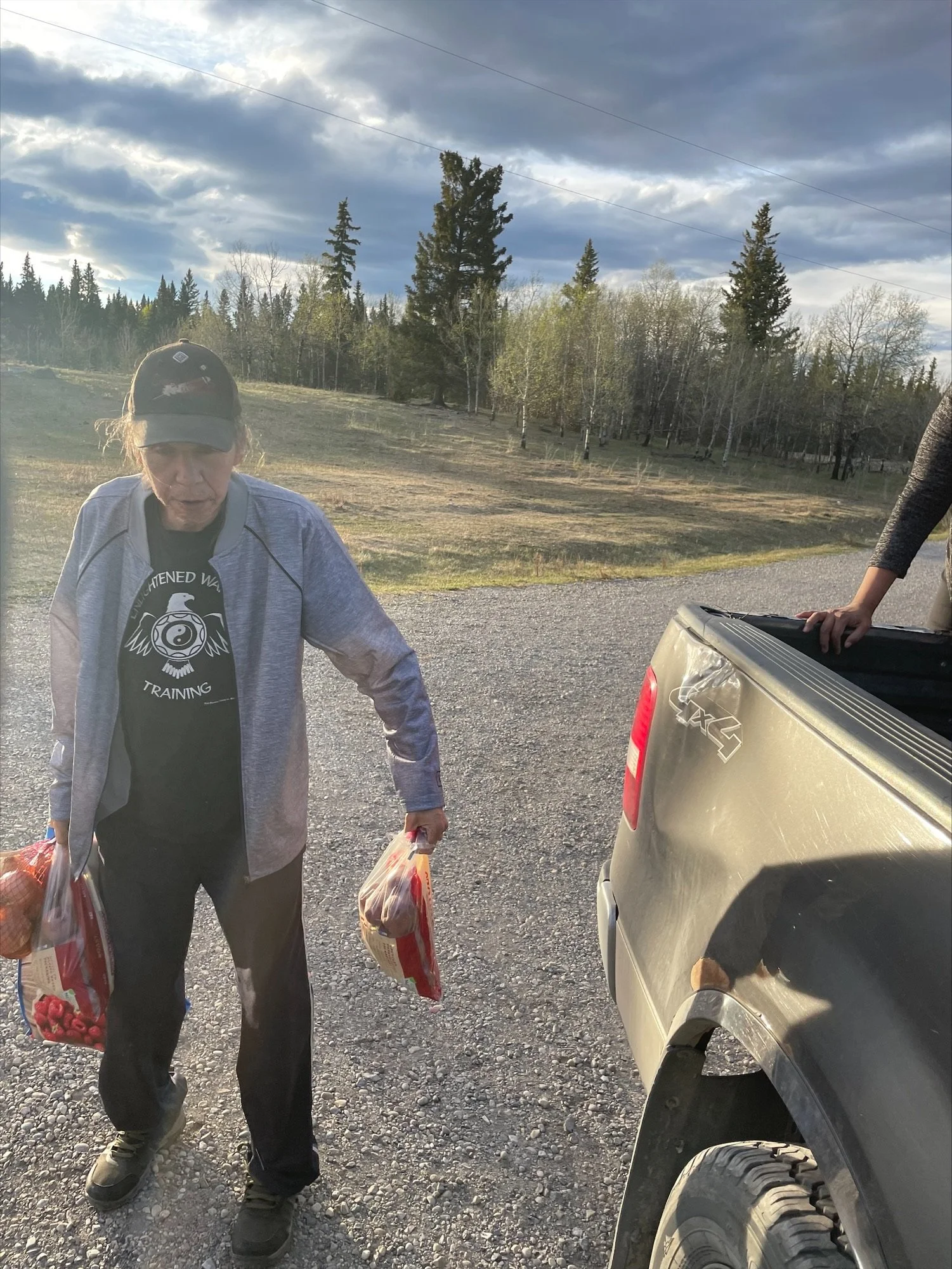 Elder receiving food.jpeg