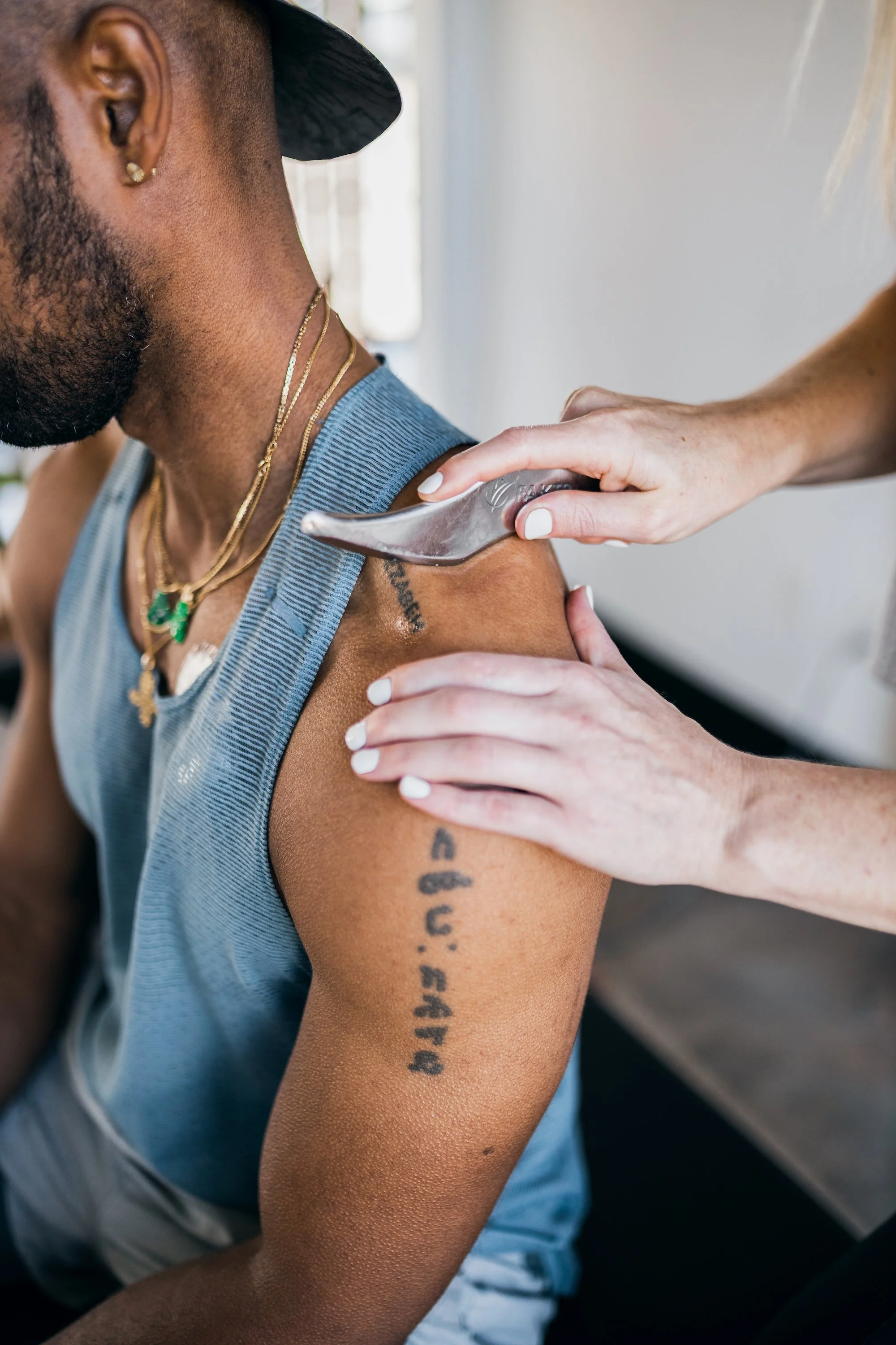 chiropractor performing soft tissue therapy and chiropractic in Newport Beach