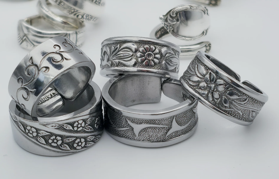 Pile of handmade rings made by Boehm Designs  at Country Lane Artisan Village Queenstown NZ