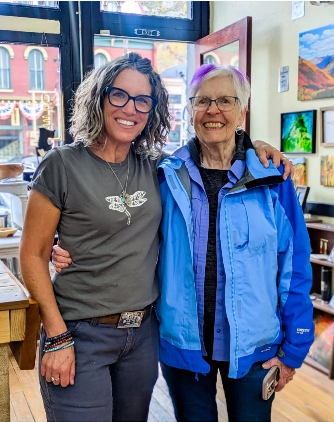 Beth Anderson, The 9318 Collective owner/founder with a happy art collector.