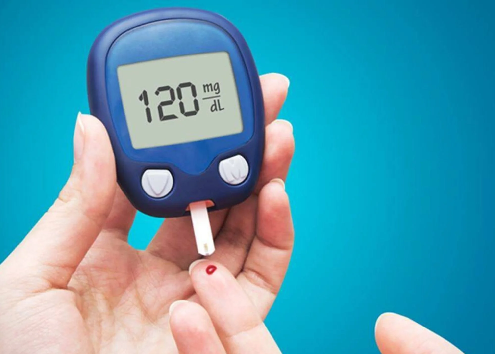 Woman testing her blood sugar - insulin resistance