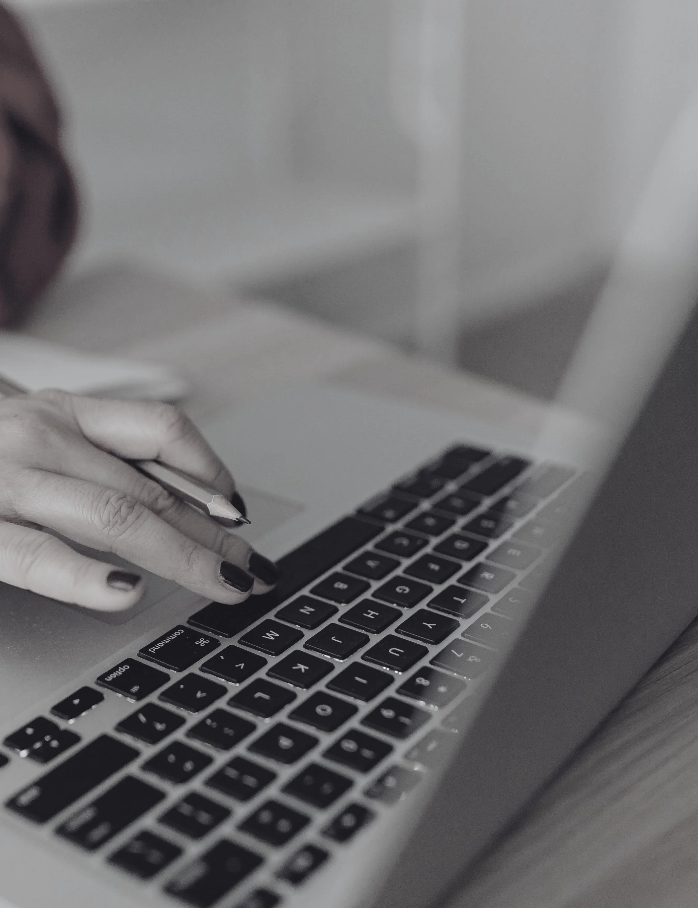 Close-up of a Squarespace Web Designer working on a website