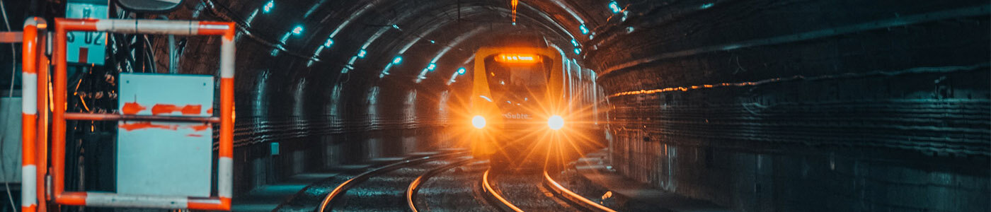 Rail Cyber Security Series Blog Image - Train approaching underground rail station platform