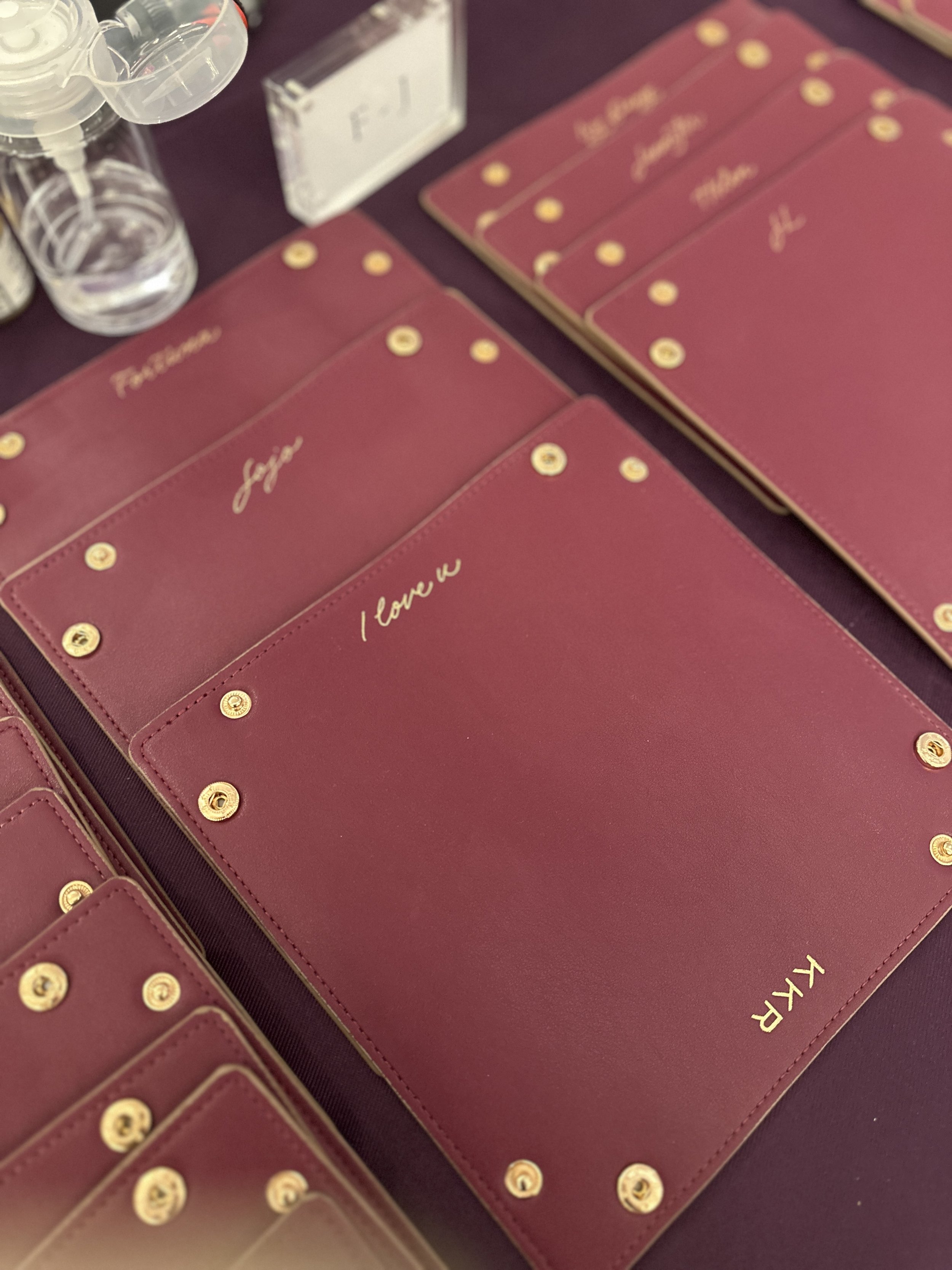 On-site Calligraphy Heat Foiling on Leather trays for conference in Hong Kong