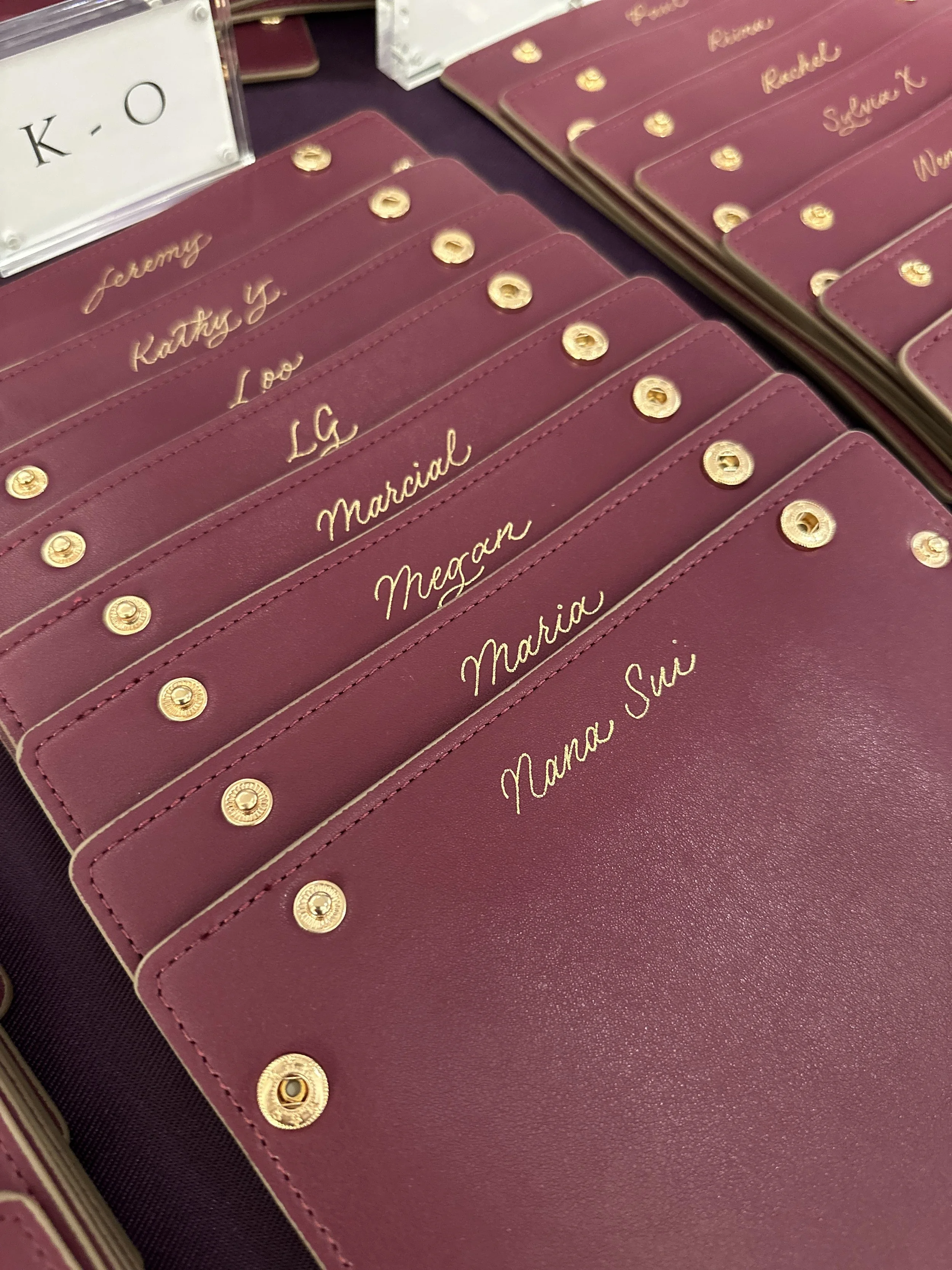 On-site Calligraphy Heat Foiling on Leather trays for conference in Hong Kong