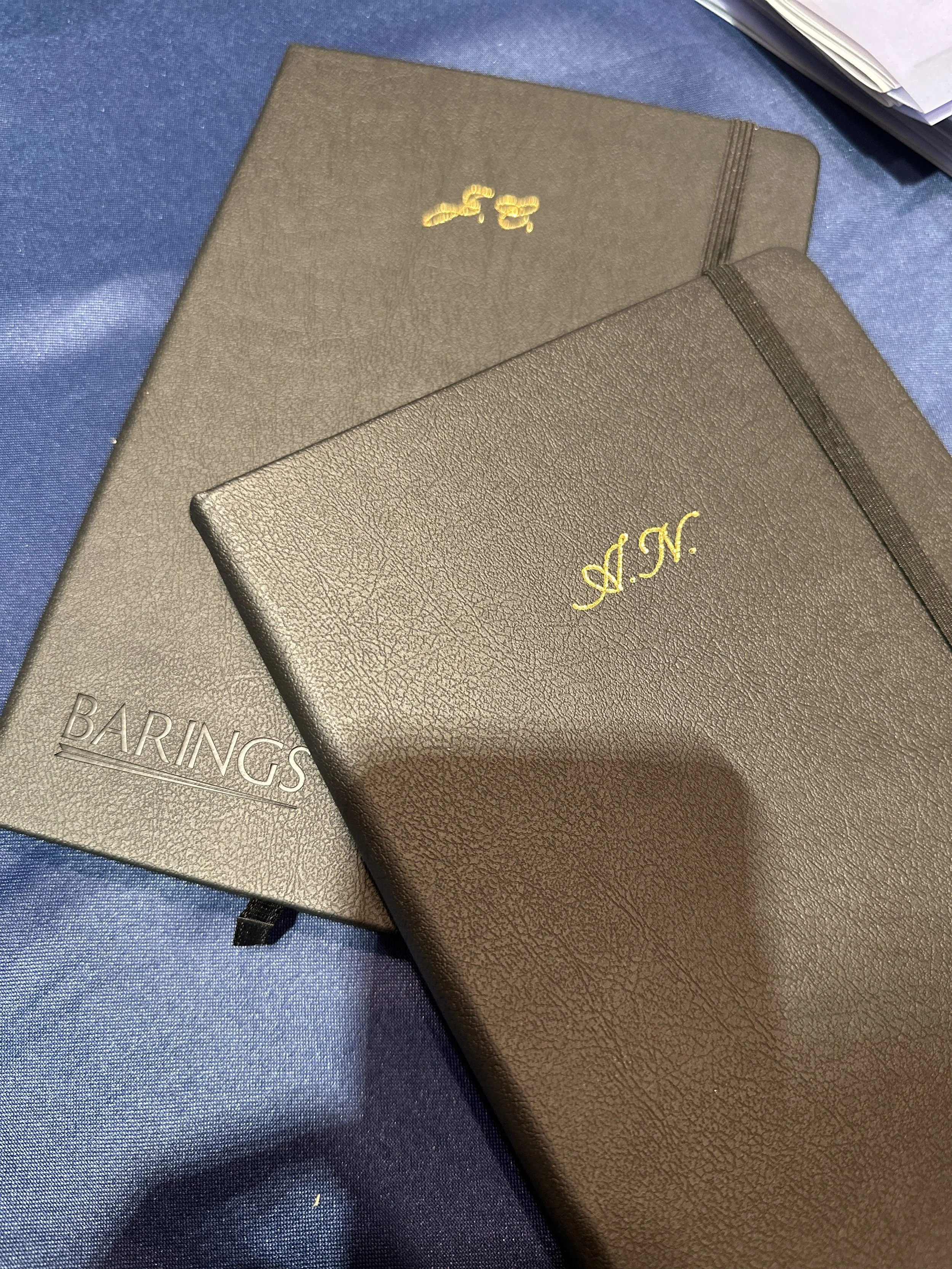 On-site Calligraphy Heat Foiling on notebooks for client event in Hong Kong