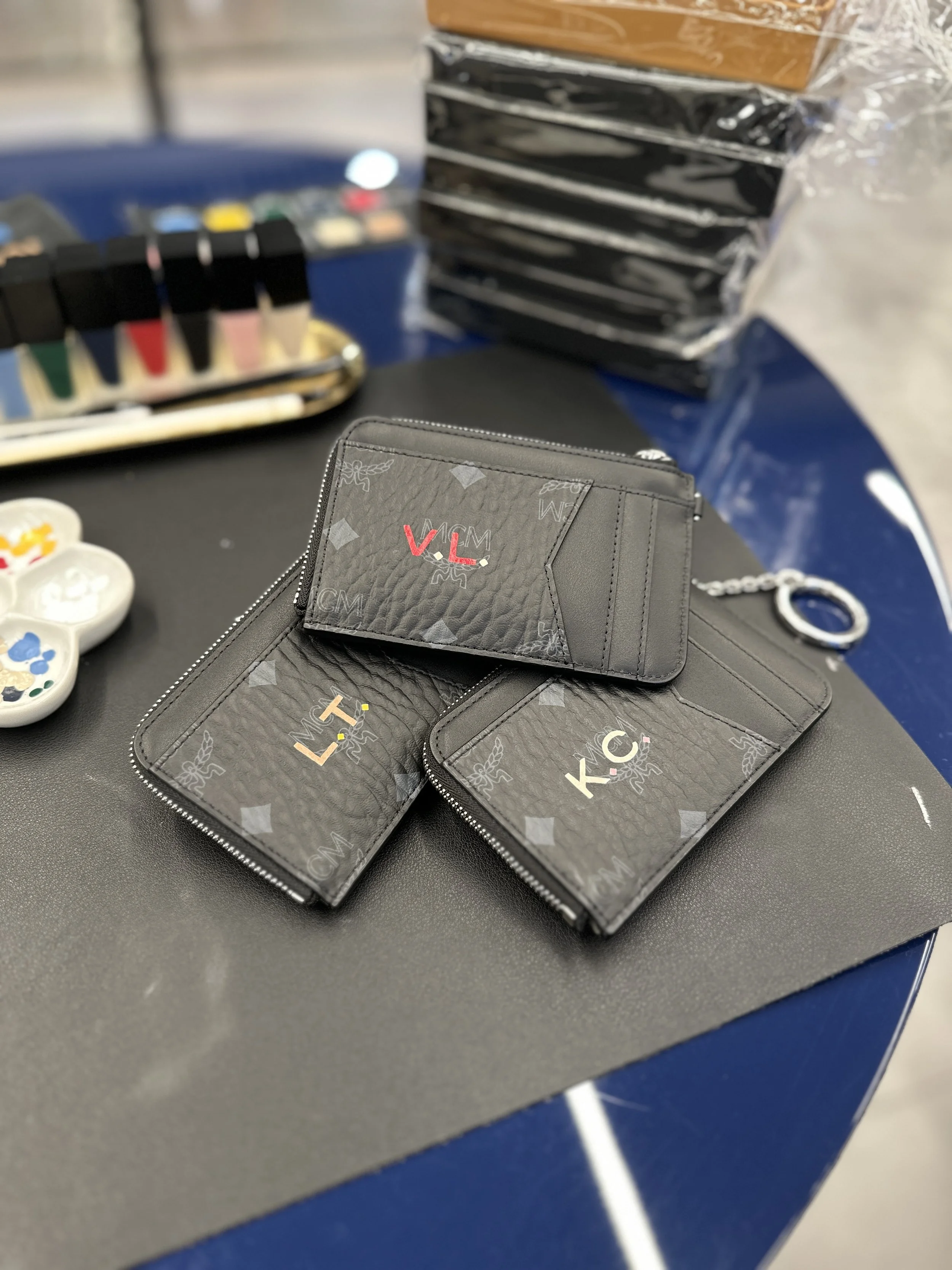 On-site Leather Painting on Bags and Accessories for MCM by Hong Kong Calligrapher and Artist