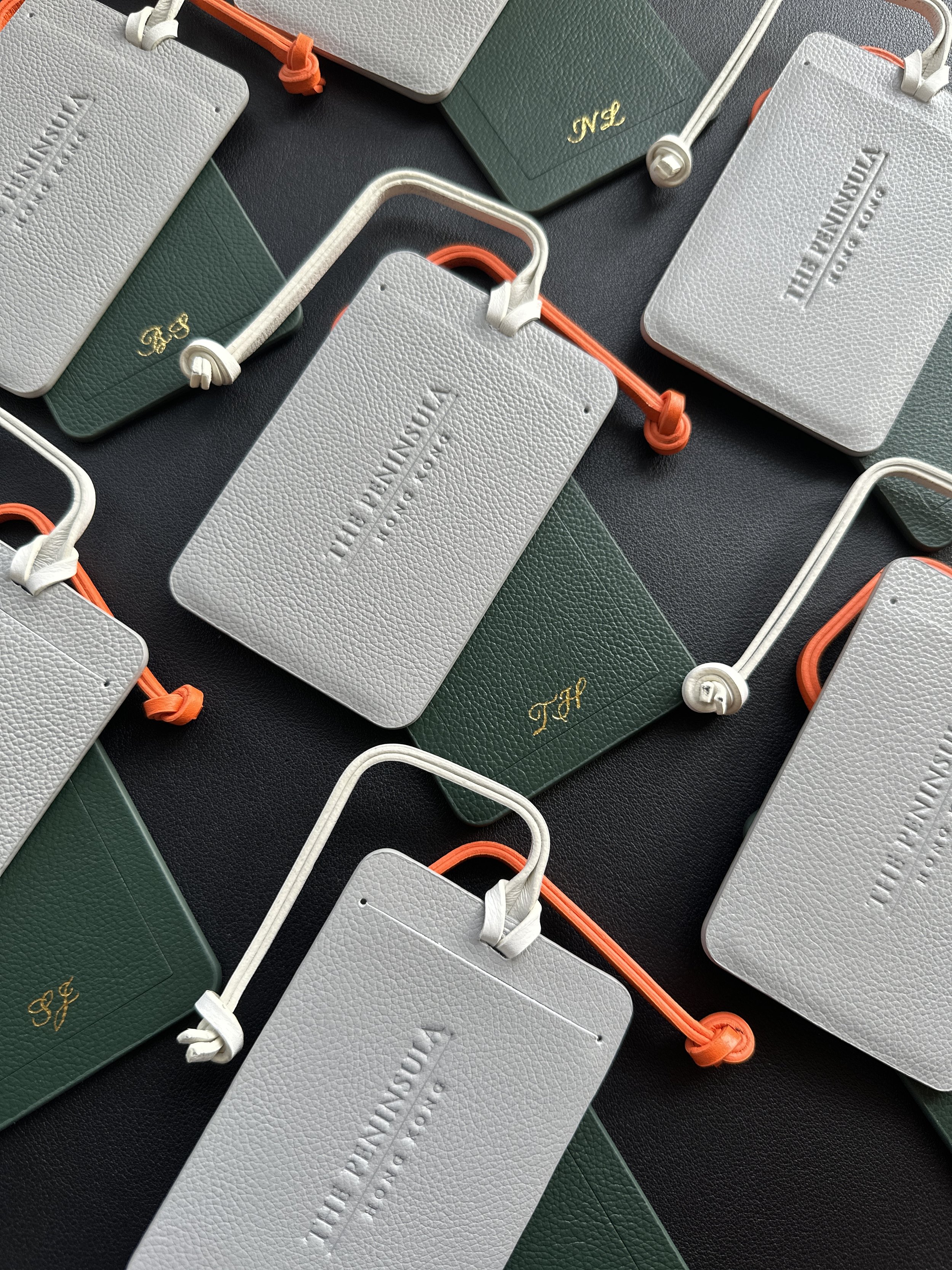 Heat Foiling Personalisation on luggage tags for The Peninsula Hong Kong