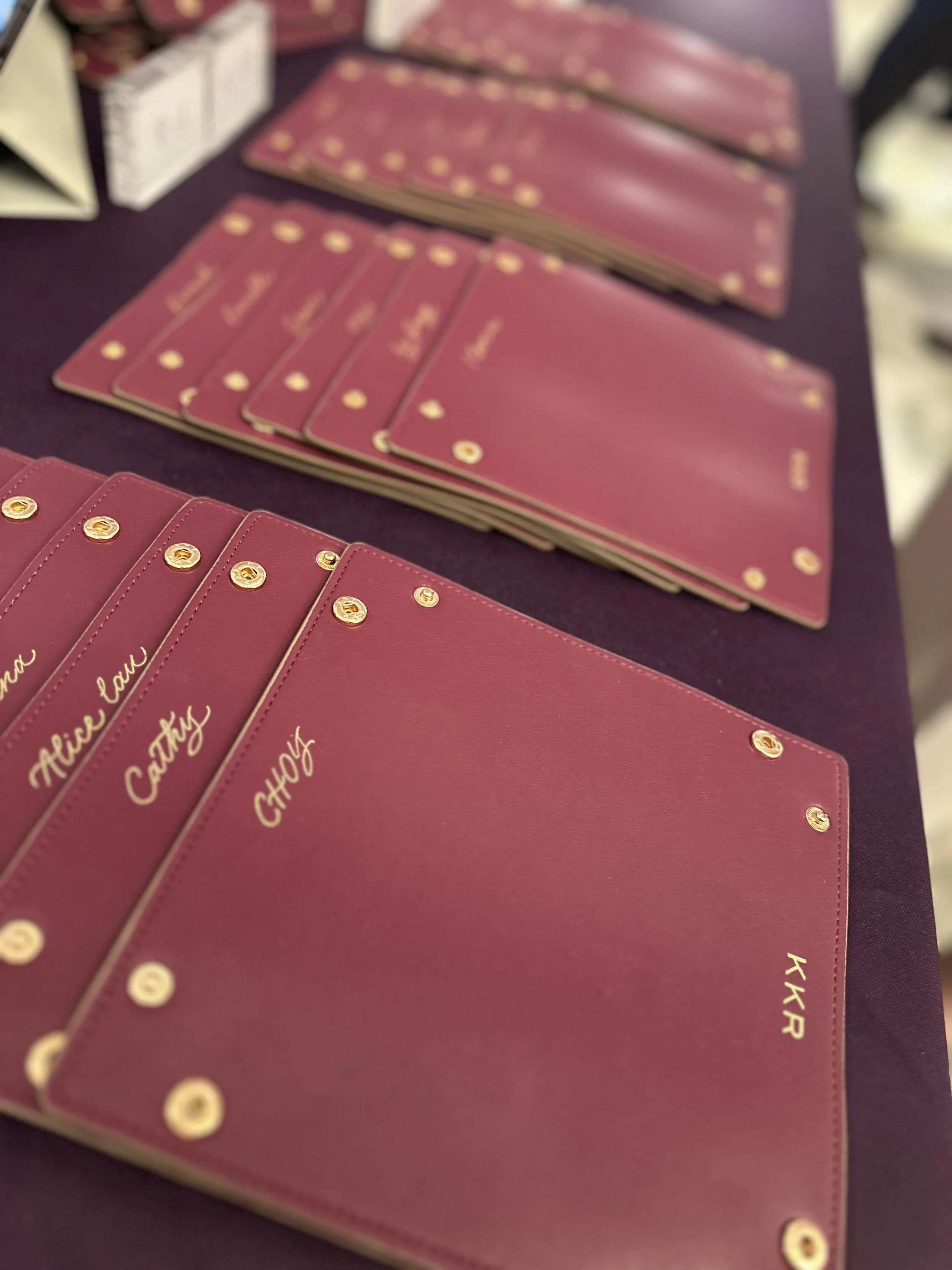 On-site Calligraphy Heat Foiling on Leather trays for conference in Hong Kong