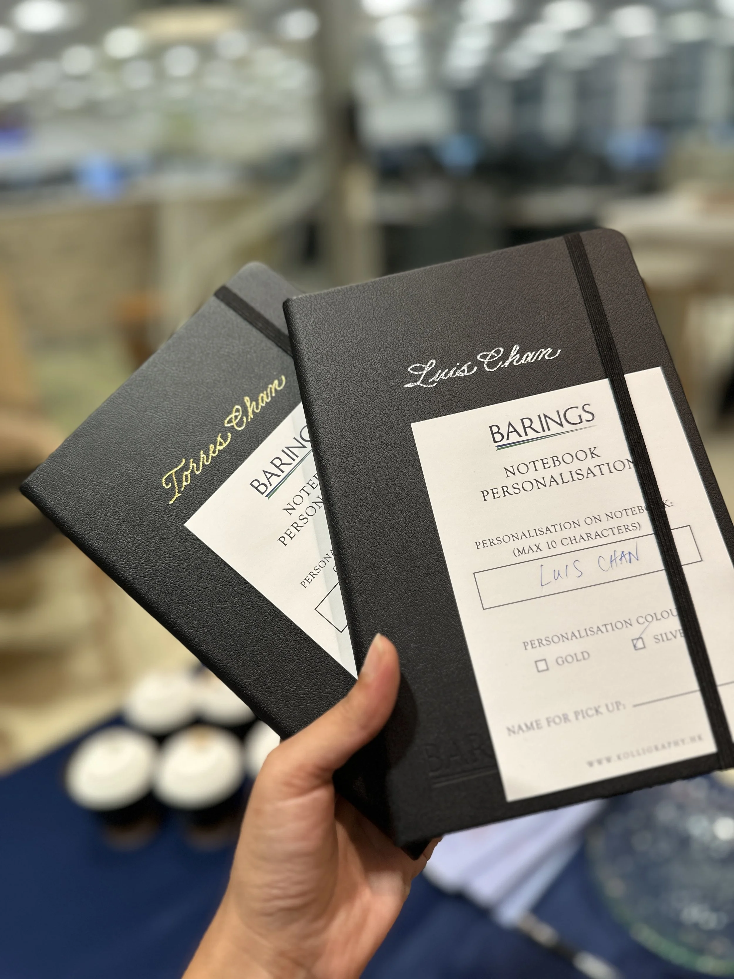 On-site Calligraphy Heat Foiling on notebooks for client event in Hong Kong