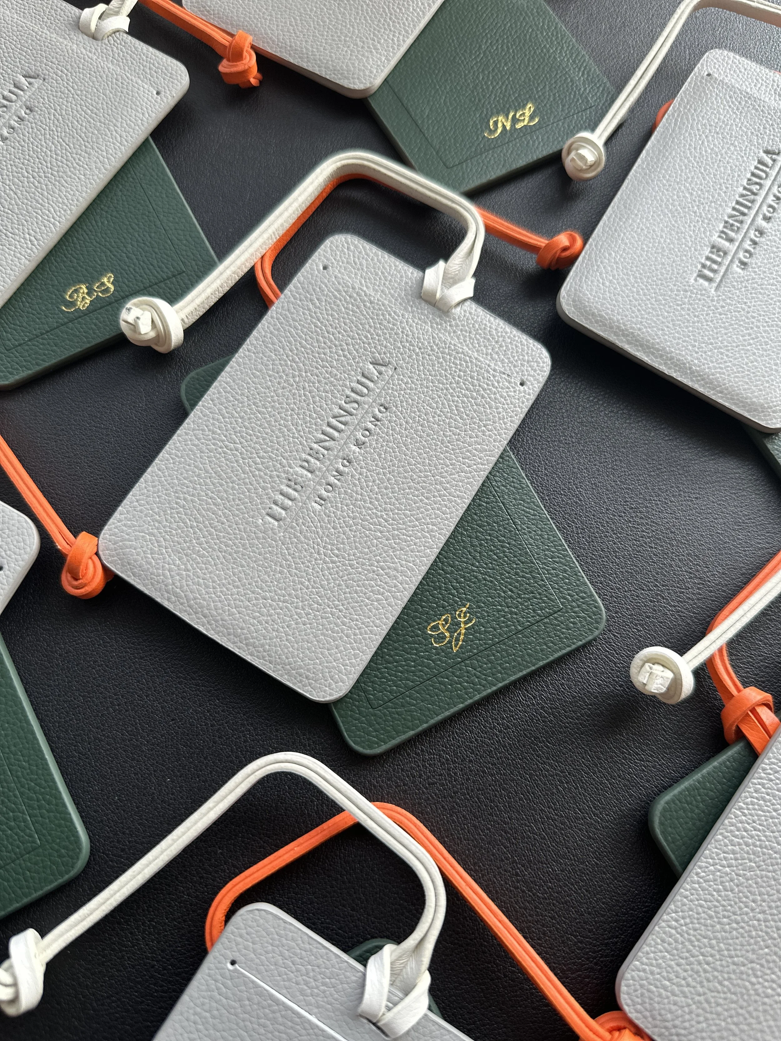 Heat Foiling Personalisation on luggage tags for The Peninsula Hong Kong
