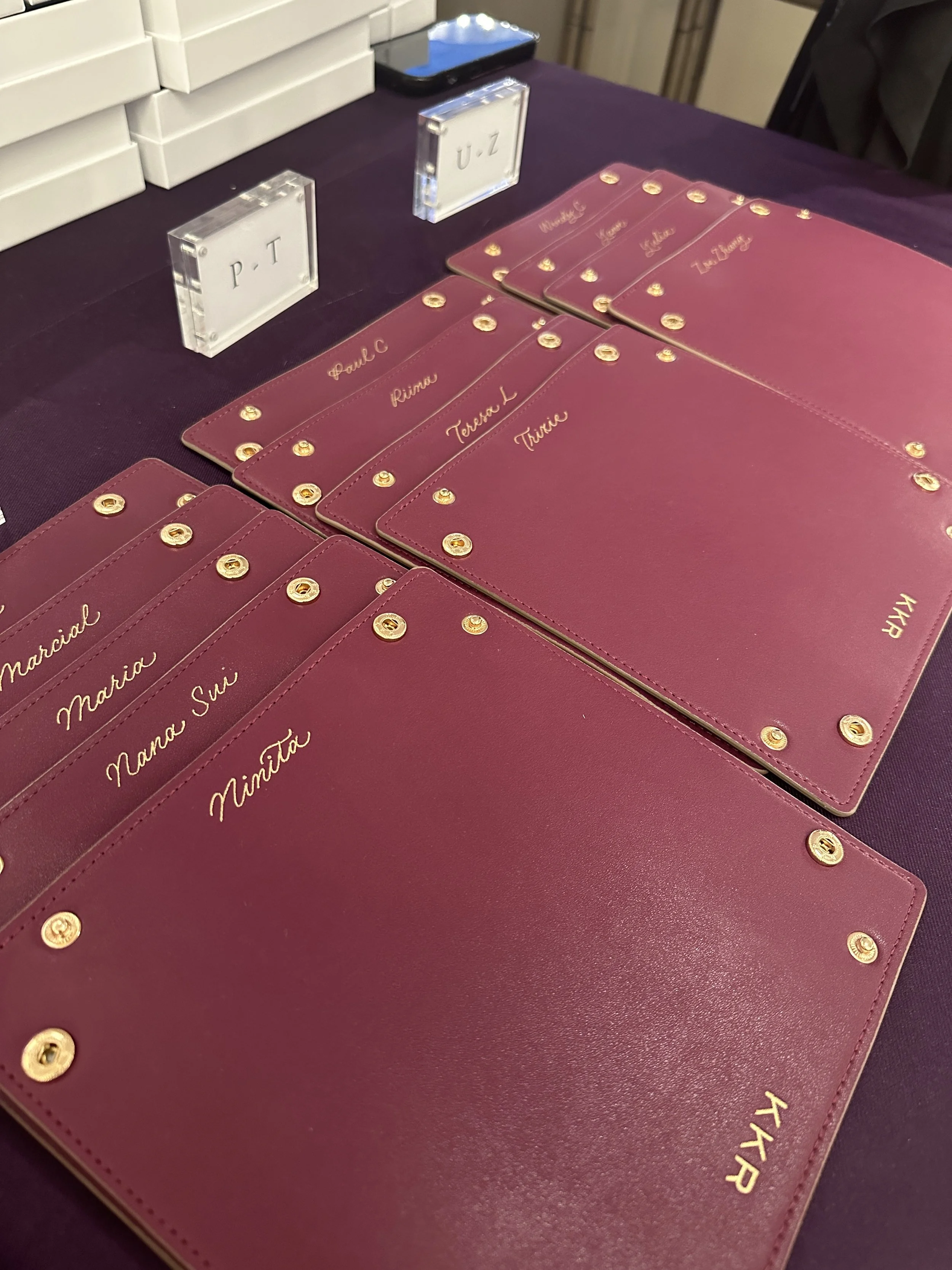 On-site Calligraphy Heat Foiling on Leather trays for conference in Hong Kong