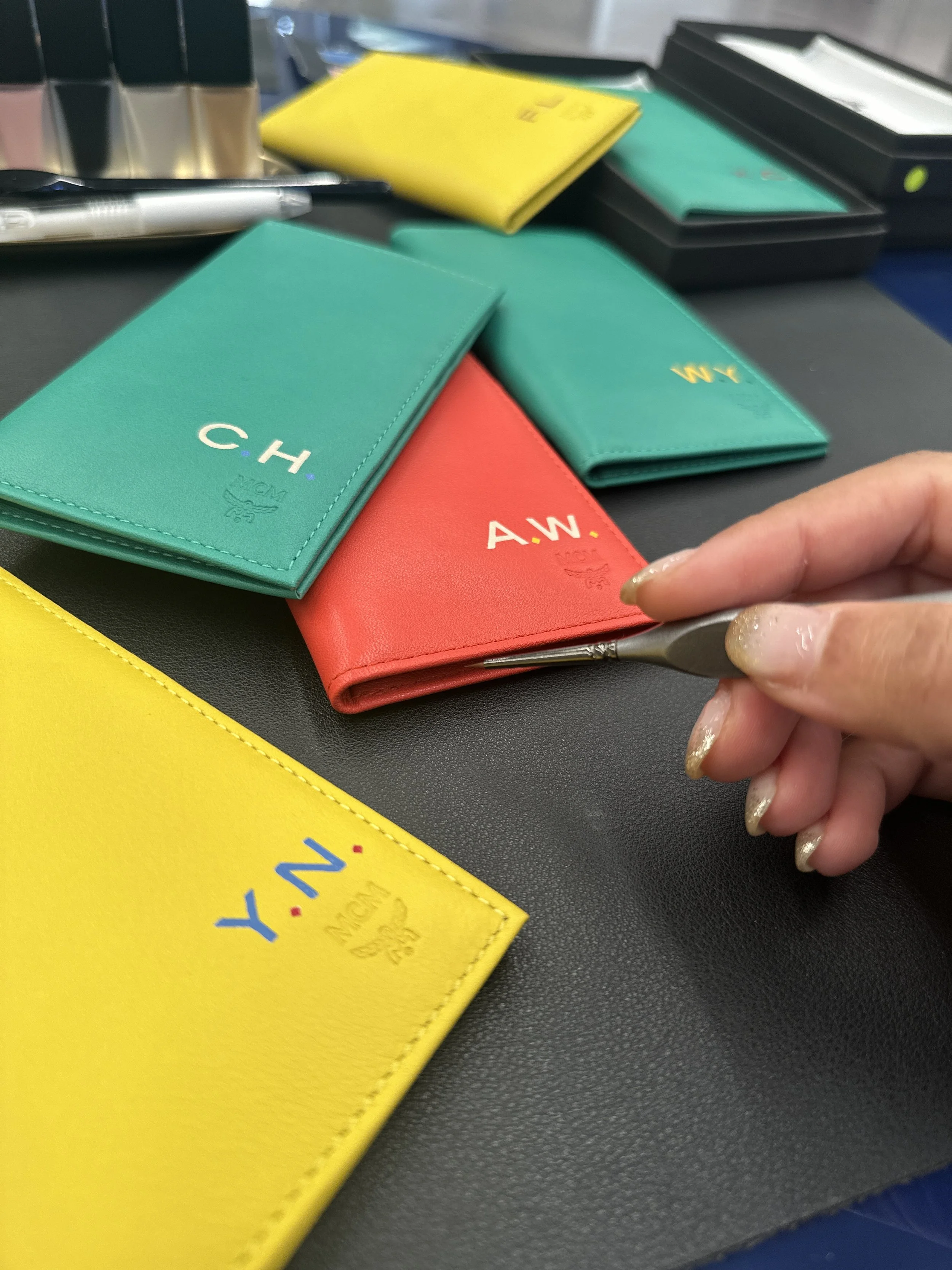 On-site Leather Painting on Bags and Accessories for MCM by Hong Kong Calligrapher and Artist
