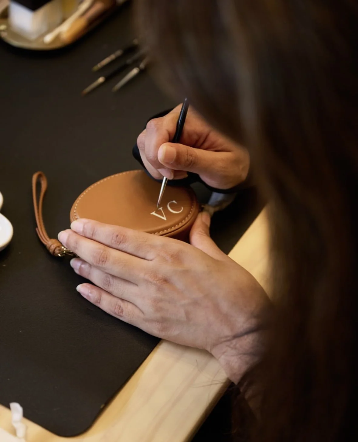 On-site Leather Painting on Bag Charms for Cafune Hong Kong pop up at IFC