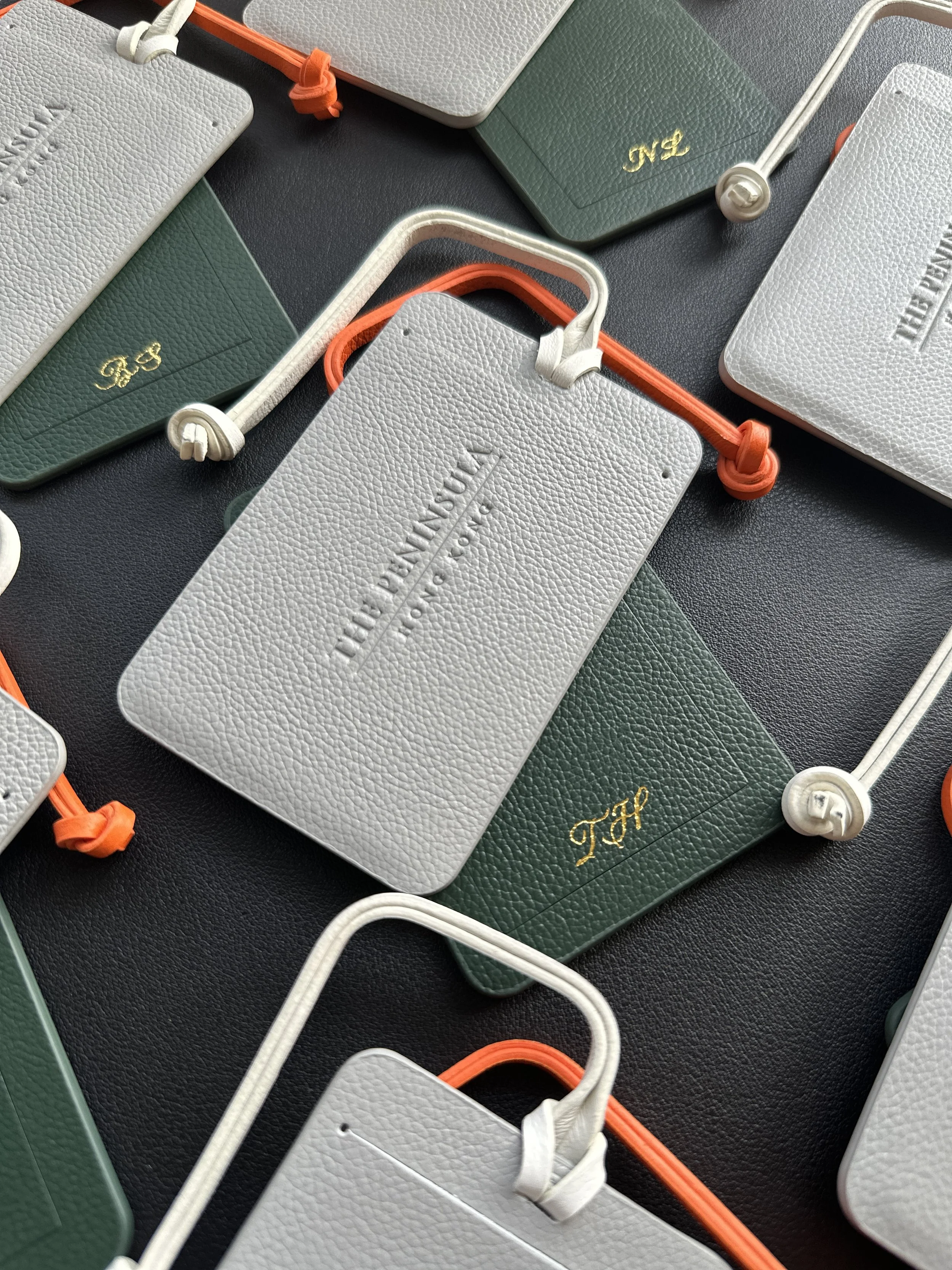 Heat Foiling Personalisation on luggage tags for The Peninsula Hong Kong