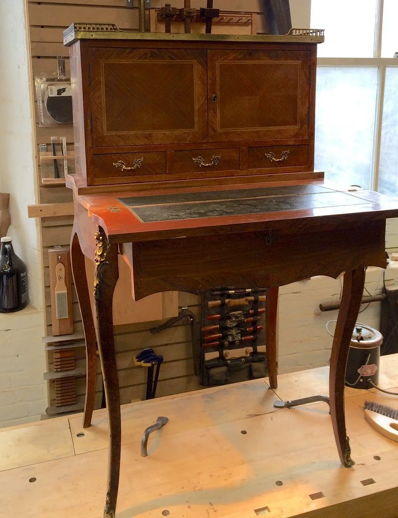 This beautiful desk arrived at the shop in many pieces.