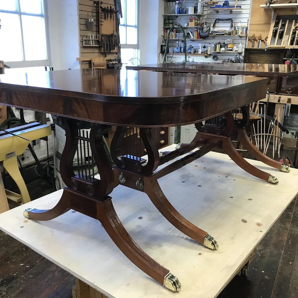 Restored table.  Legs were laminated and in pieces and rebuilt in solid mahogany.