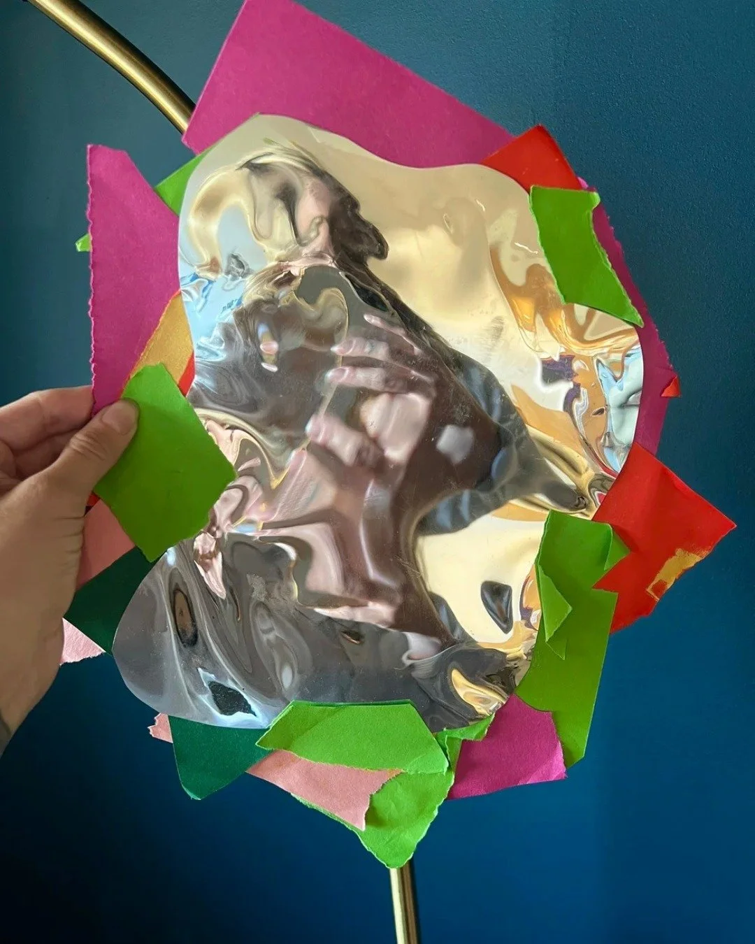 FAMILY FUN ZONE: Mirror Art 🪞 

Explore the magic of reflection through collage with mirror paper; watch the world warp and transform. Use cut and layered paper shapes to build a colourful frame around your mirror. 

Note: This is a family-focused p