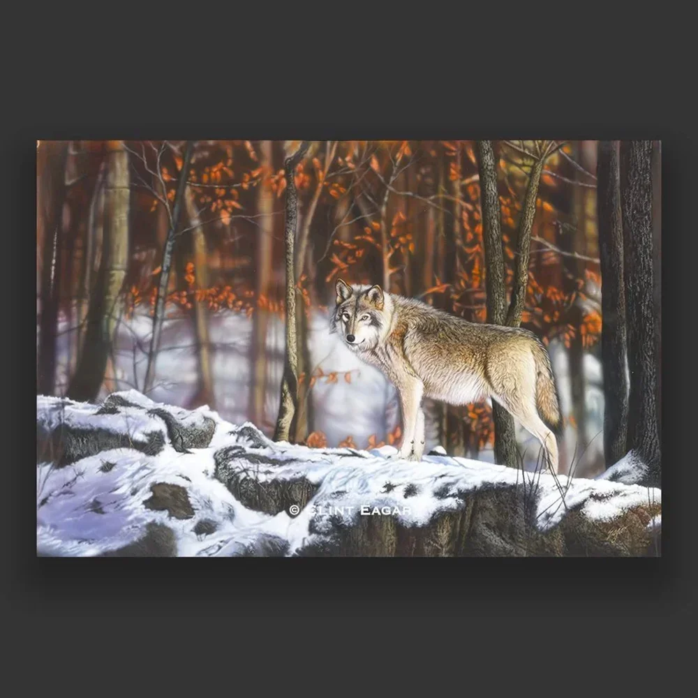 Hyper-realistic gray wolf wildlife painting by Clint Eagar standing on a snowy rock ledge, textured fine art for collectors.