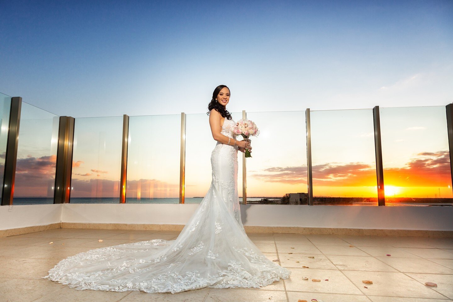 Sunsets on this rooftop are unbeatable! Have to always bring our brides up here for some pictures that won't be forgotten #beachyvows⁠
⁠
Visit BeachyVows.com for the best destination wedding ideas and venues! Beachy Vows only takes on a limited numbe